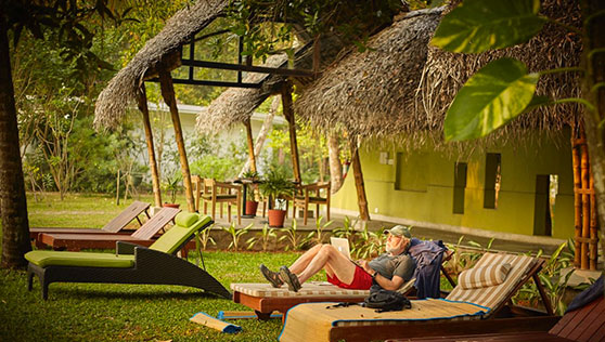 Lounge on the lawns at Xandari Beach resort Kerala